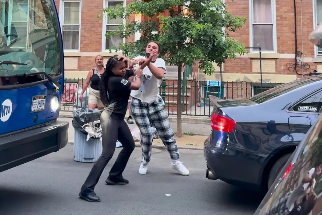 Unhinged mom, daughter attack motorist, spew racial slurs in NYC parking spot brawl, as locals fume over space hoarding: video....An unhinged mom and her foulmouthed daughter savagely attacked a female driver for trying to park in a spot they were “saving” in a caught-on-video brawl in Queens.....Post news hot today, Hot news today, News hot today, Hot news today on the world, NYC today news, New York news video, New York State news
