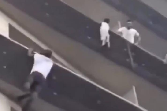 This hero didn't hesitate for a single second to climb several floors to save this little boy suspended in the void. Shocking clip of baby hanging from high-rise apartment railing, US news video today, Today news Video, Video Russia News HOT Today, Hot news today, Today News Philadelphia, Post news hot today, Moscow News HOT Today Video, US today news, US news today, News hot today, Shock news today, Hot news today on the world, Latest today news video