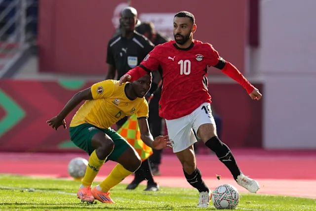Mohamed Salah scored for Egypt when they were down to 10 men, helping the hosts advance to the knockout stage of the Africa Cup of Nations. WATCH Egypt 1-0 South Africa Full Extended Highlights 2025.12.26, Africa Cup Highlights, Africa Cup Football, Video Egypt 1-0 South Africa Highlights, See Highlights Egypt vs South Africa, Egypt Goals Highlights, South Africa Full Goals Highlights, Latest Football Full Highlights, Latest Football Highlights, Kết quả bóng đá hôm nay 2025-12-26, Result Football Today 2025-12-26